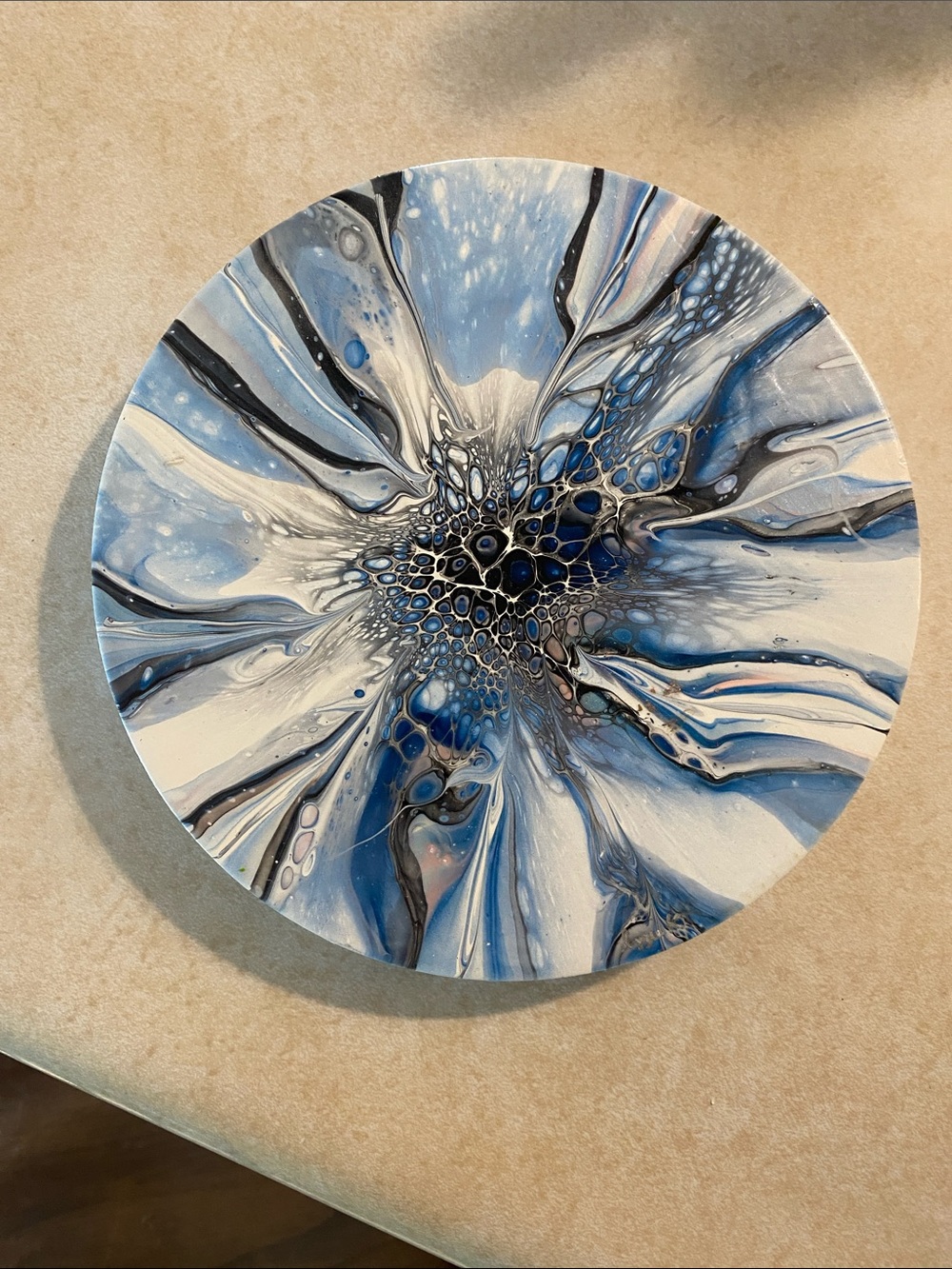 Ocean’s Iridescent Calm Blue and White Round Wall Art
